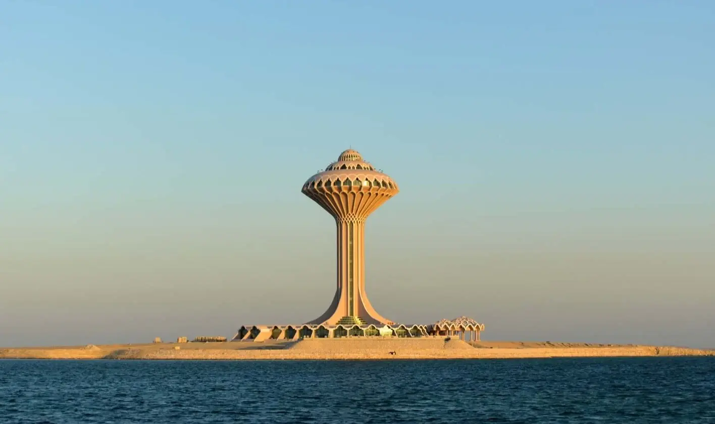 Coastal scene with an urban landmark by the sea