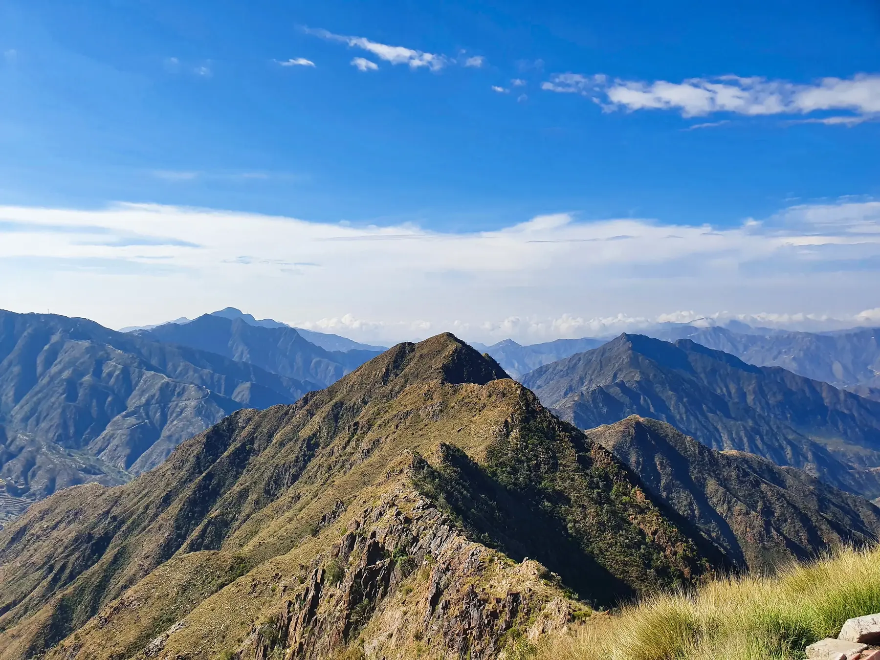 Rocky mountain highlands beneath a clear sky
